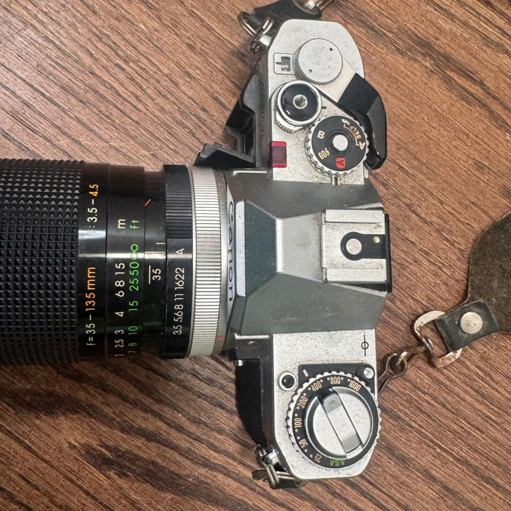Canon AV 1 35mm SLR Film Camera Silver Sakar 35 135mm Lens Strap Untested
